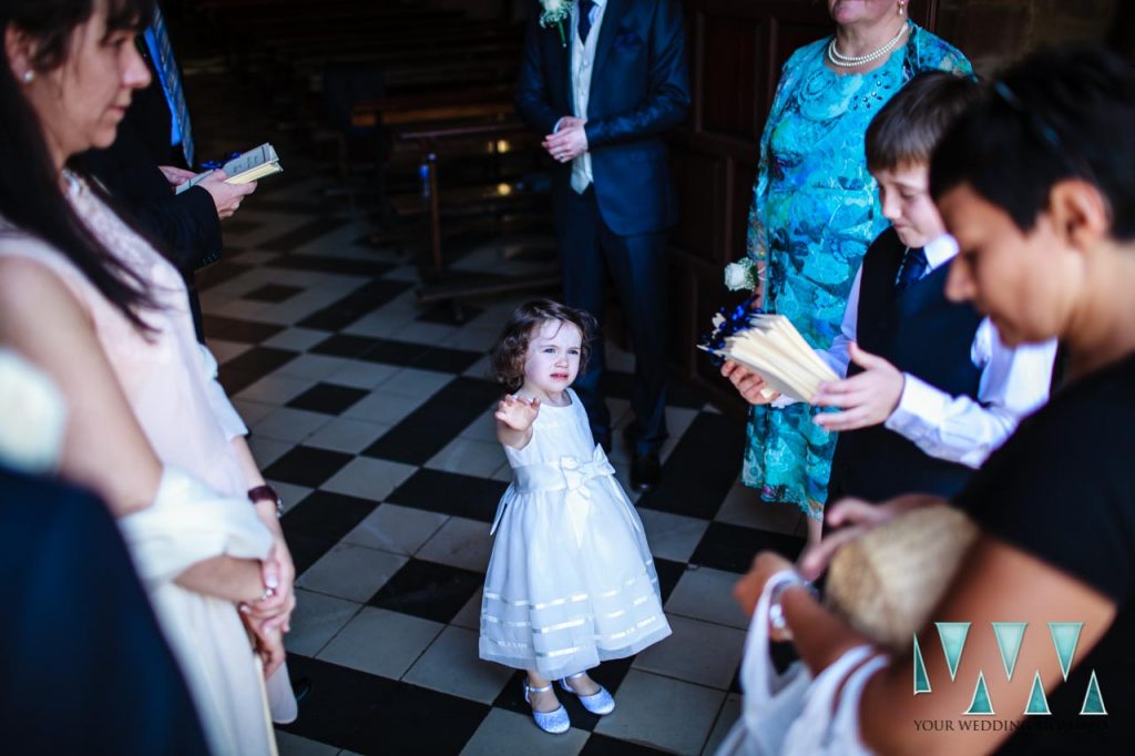 Flower girl in Ronda church