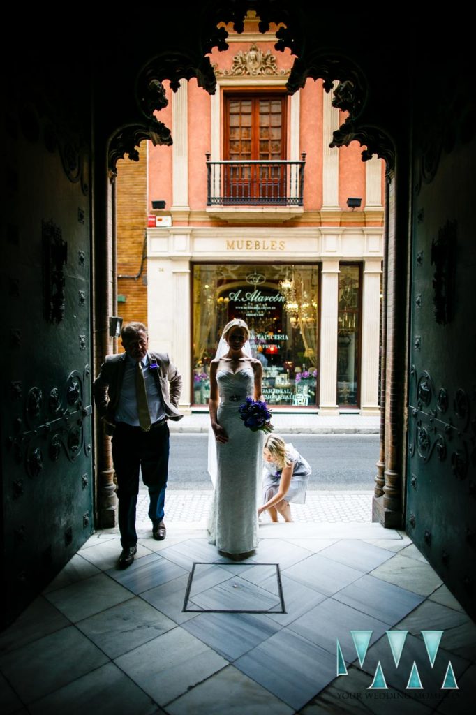 seville wedding with bride at church entrance