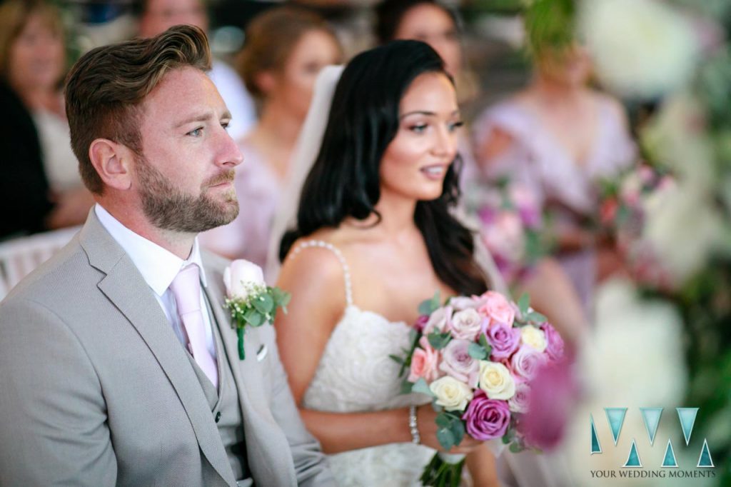 Sunset Beach Club wedding groom during ceremony