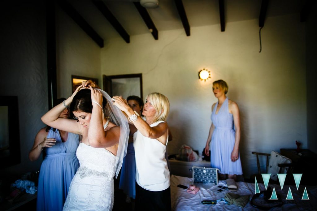 Rancho Del Ingles Wedding putting on the veil