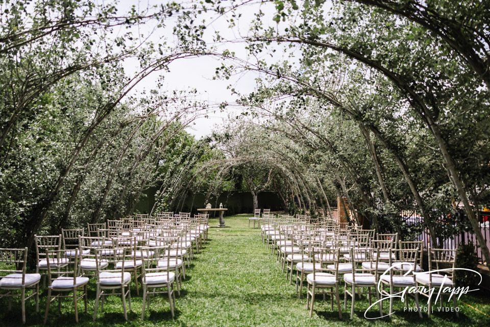 Wedding ceremony setup in the Molino Casanova gardens