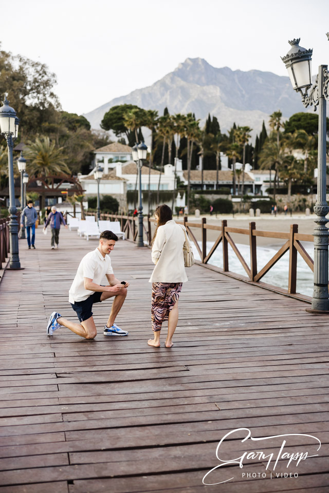 Surprise marriage proposal photography on the beach in Marbella, Spain