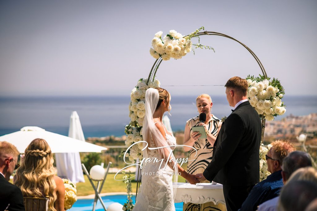 Finca Bella Vista Wedding Photographer | Mijas, Andalucia 7 Bride and grrom under the wedding arch at the Finca Bella Vista wedding venue