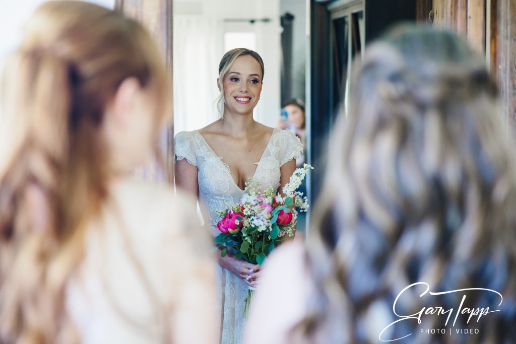 Bride having her first look with the bridesmaids at Finca Monasterio