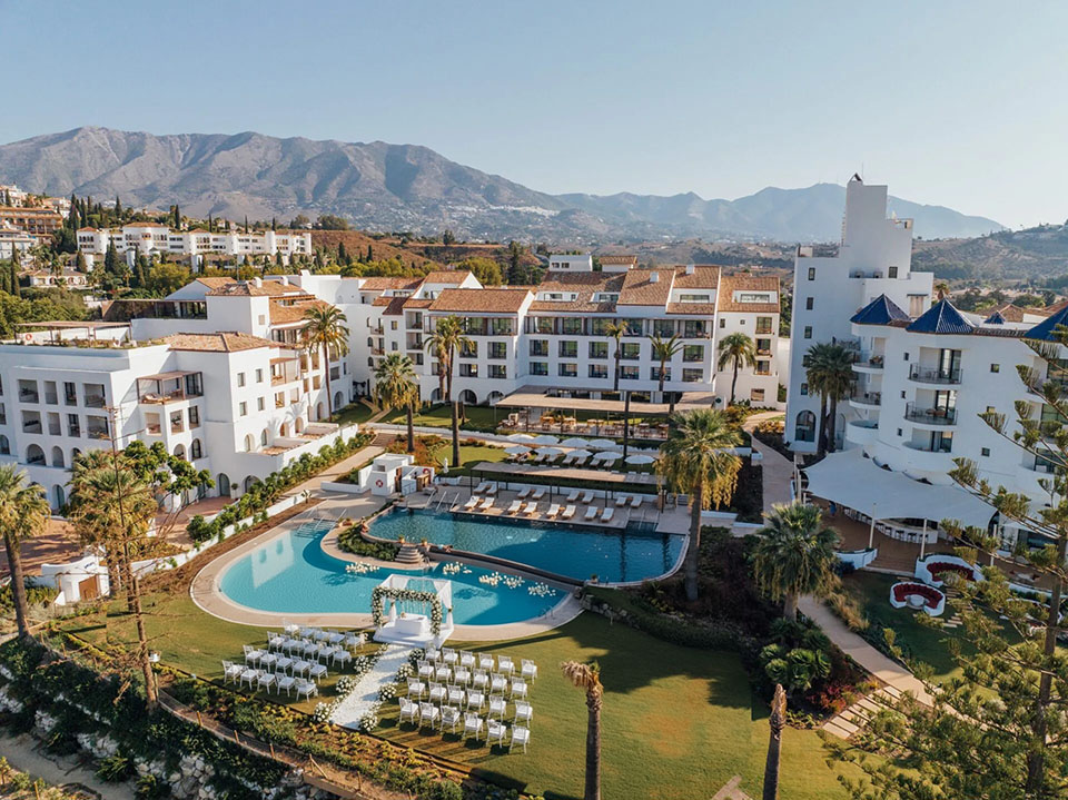 Aerial view of a wedding ceremony setup at La Zambra Resort